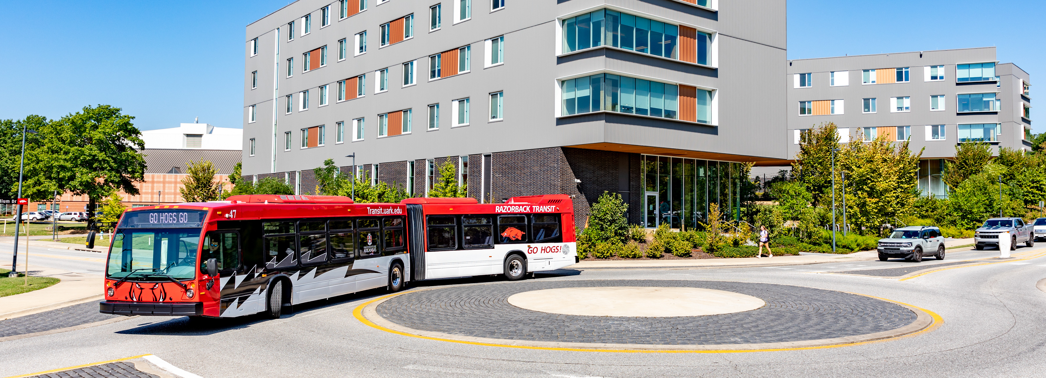 Razorback Transit bus going around a round about