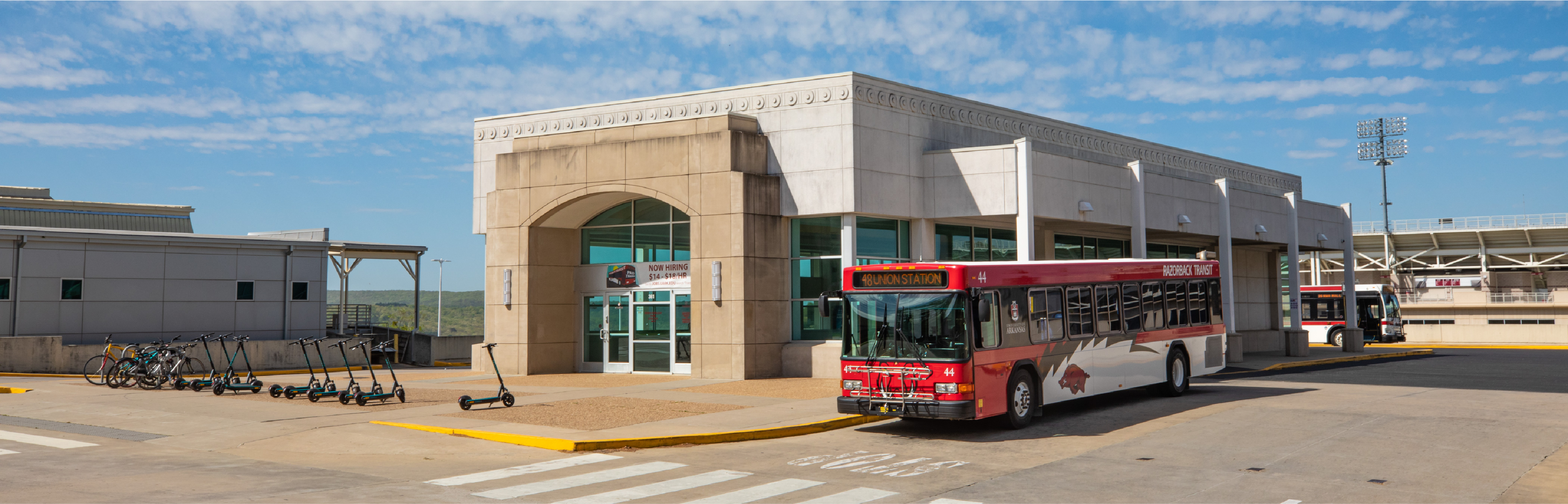 Hero image of a Razorback Transit bus outside of union station